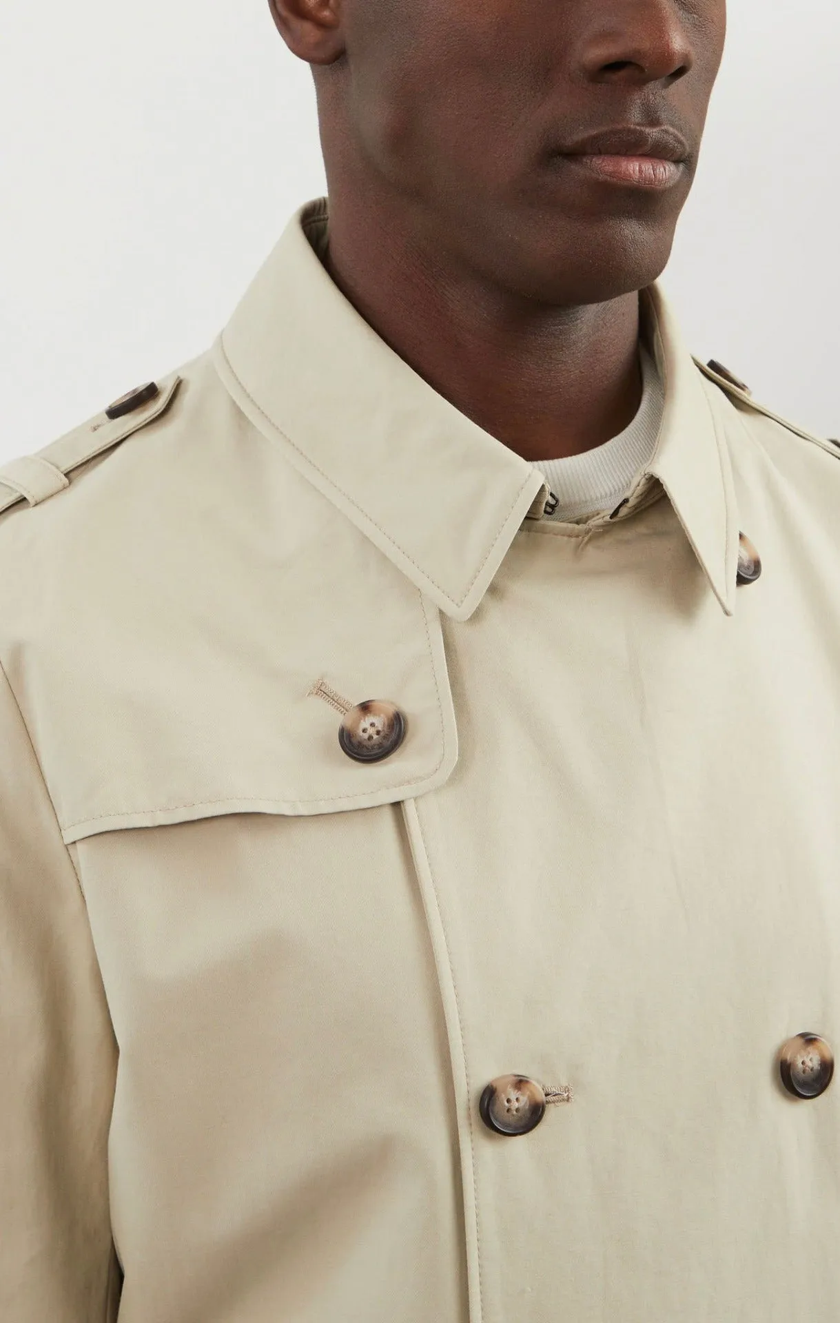 Beige water-repellent trench coat