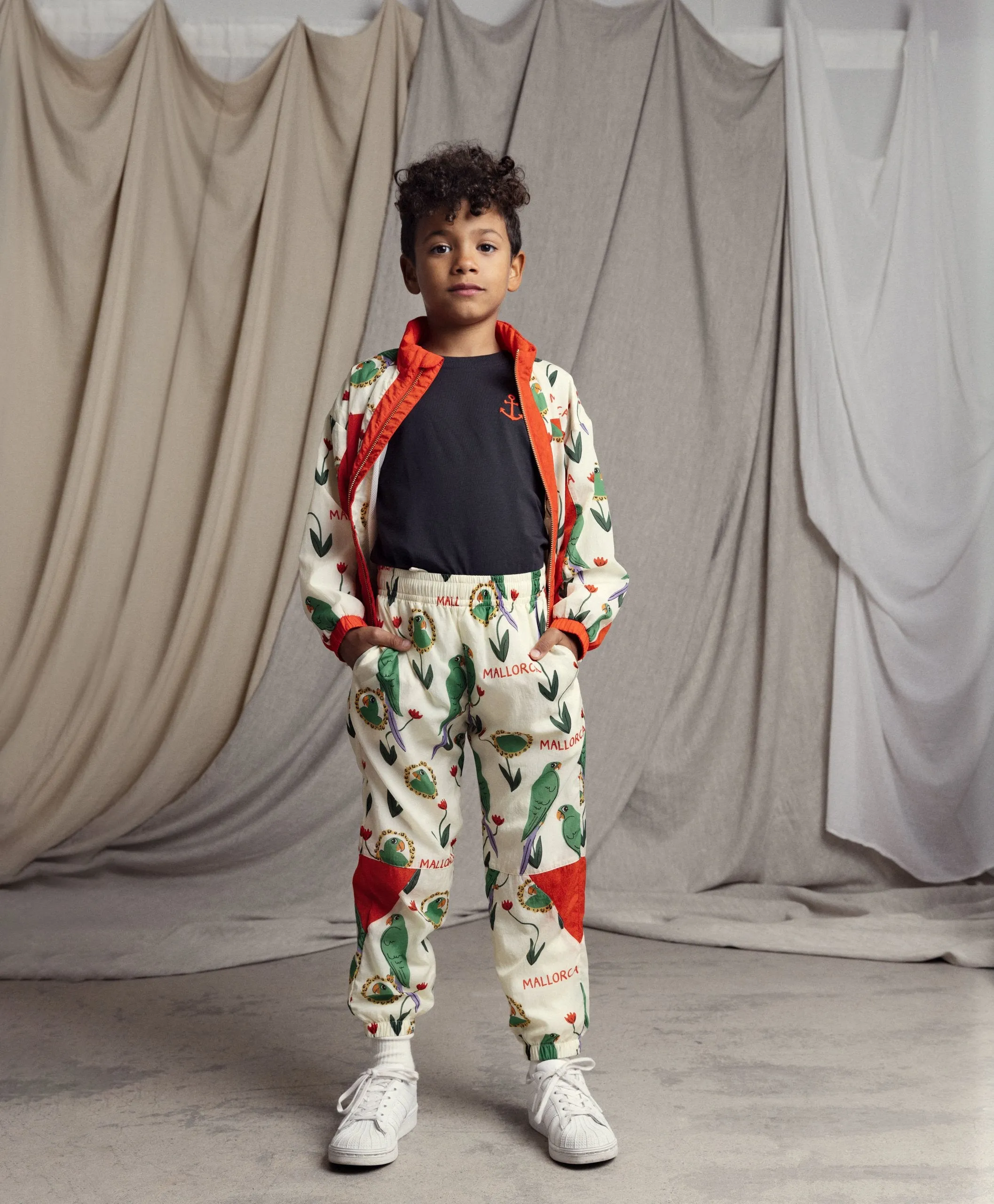 Mini Rodini | Parrots aop nylon tracksuit pants