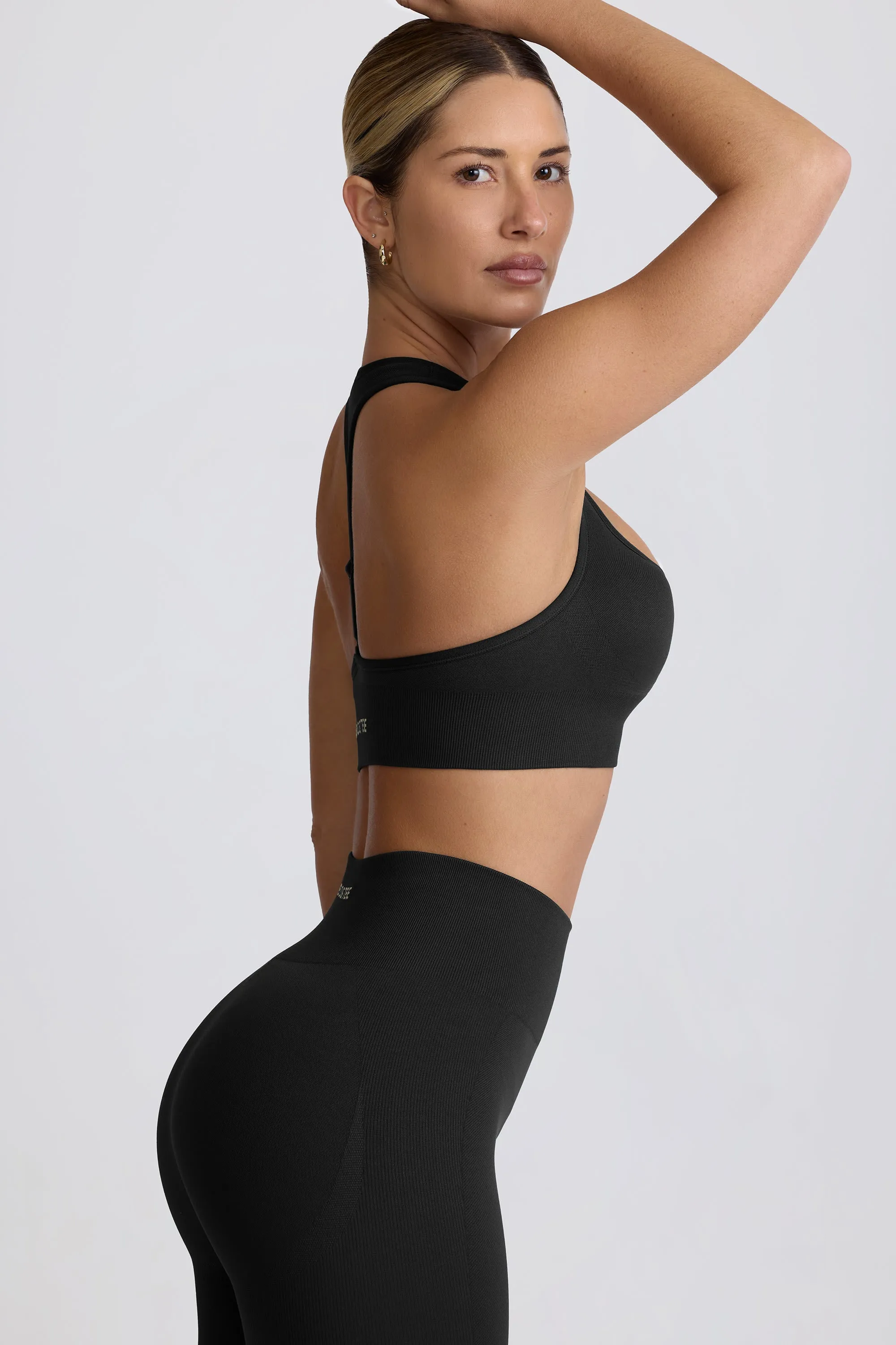 Super Sculpt Seamless T-Back Sports Bra in Black